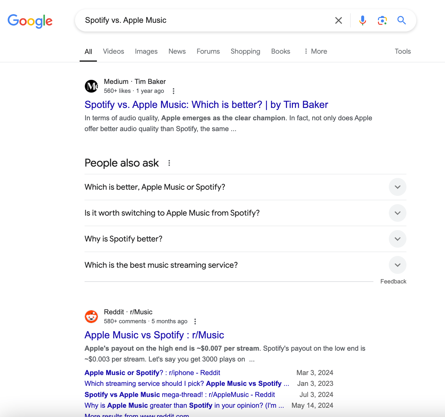 Search results for query "Spotify vs. Apple Music" in Google